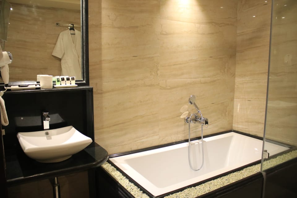 Shower, free toiletries, hair dryer, slippers