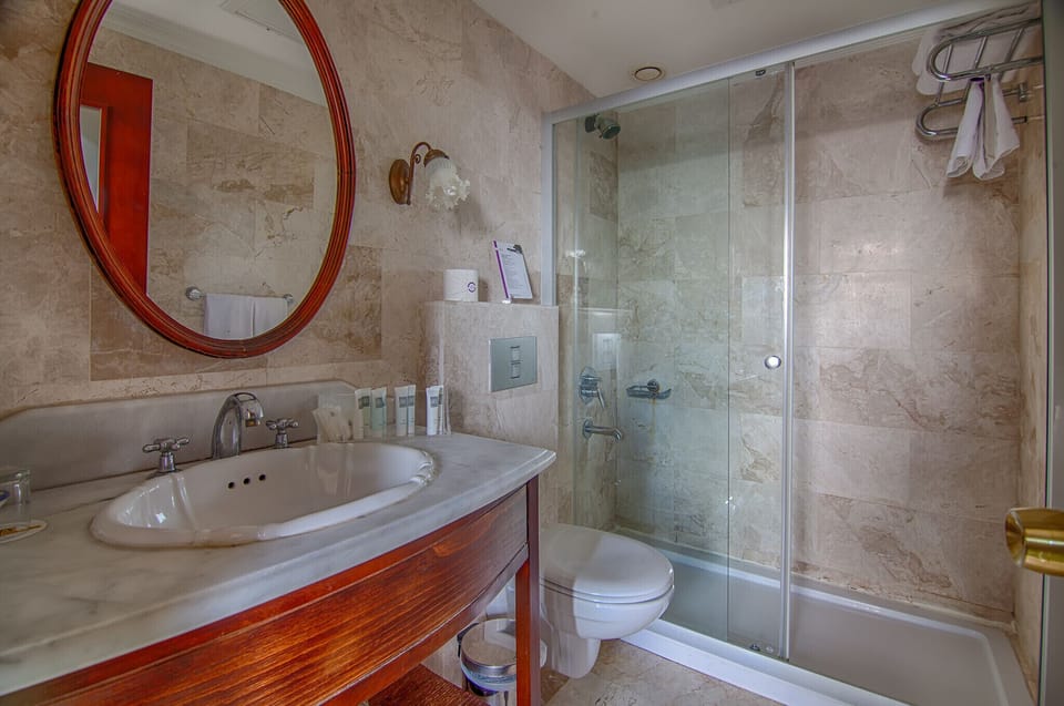 Standard Double Room, Sea View | Bathroom | Shower, hair dryer, bathrobes, slippers