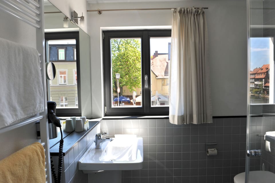 Double Room | Bathroom | Shower, hair dryer, towels