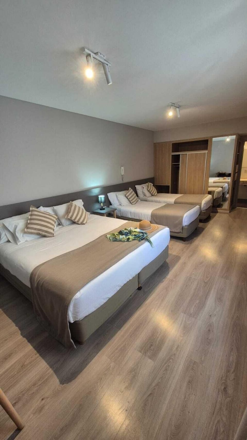 Standard Quadruple Room | Minibar, in-room safe, desk, laptop workspace