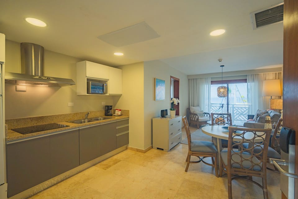 Luxury Suite, 1 Bedroom, Kitchenette, Ocean View | Private kitchen | Fridge, microwave, coffee/tea maker, cookware/dishes/utensils