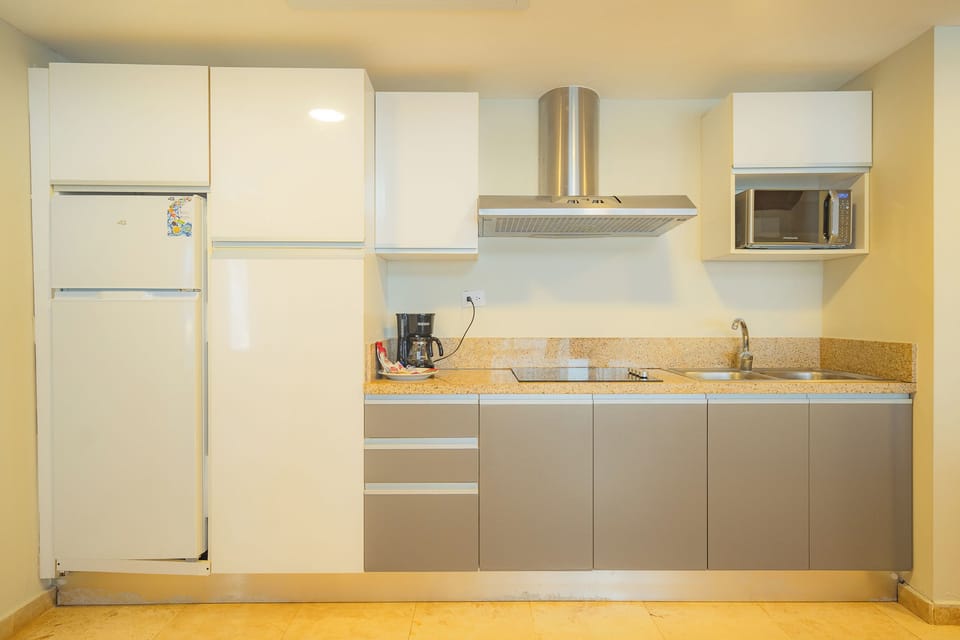 Luxury Apartment, 2 Bedrooms, Kitchenette, Ocean View | Private kitchen | Fridge, microwave, coffee/tea maker, cookware/dishes/utensils