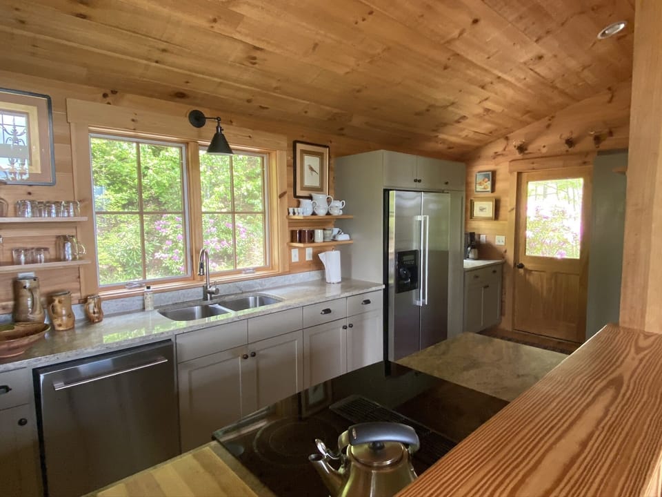 Kitchen view towards side porch entrance