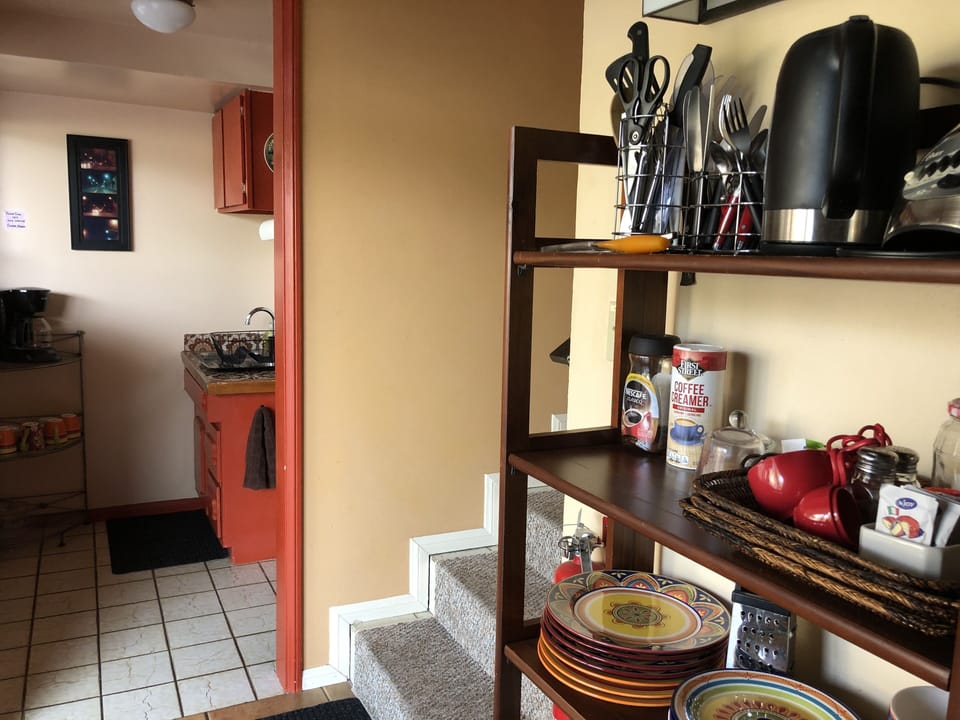 Entrance to Stairwell and Kitchenette 