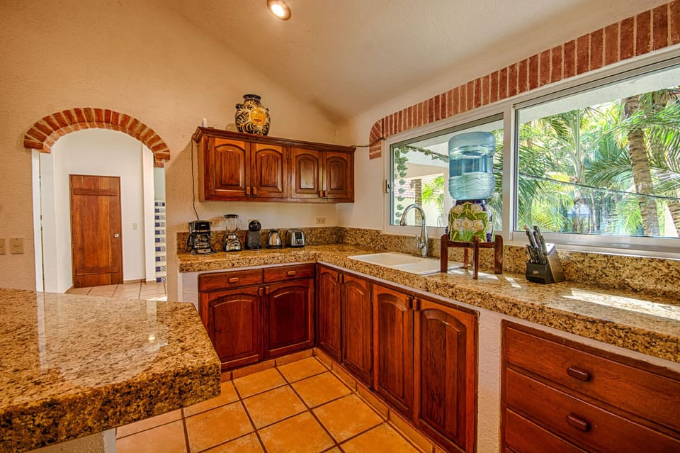 Fully equipped and stocked kitchen for you or a chef to prepare every meal!