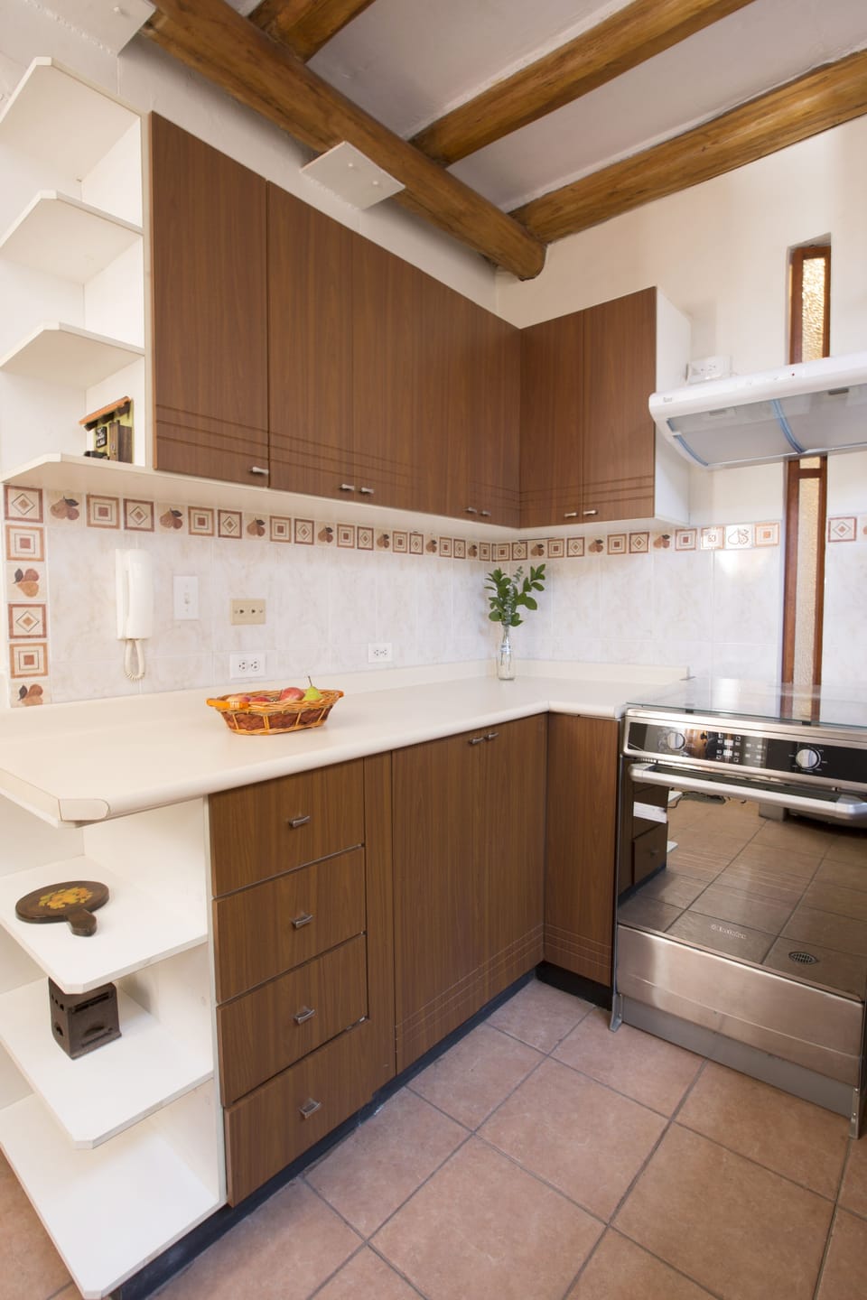 Beautiful exposed natural wooden beams & wooden kitchen cabinets