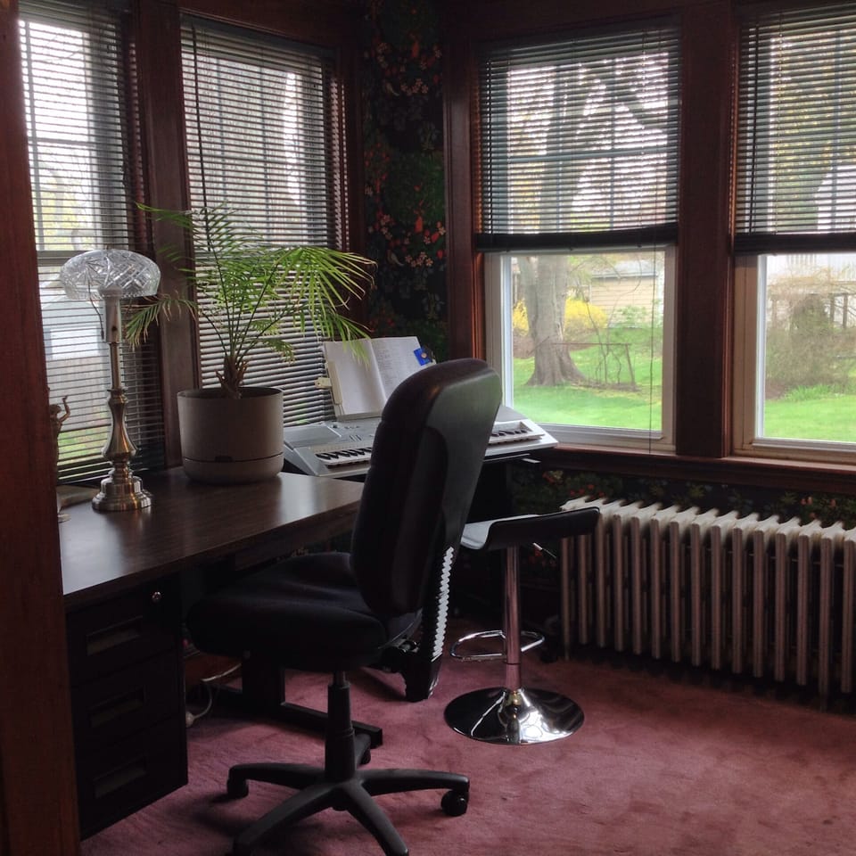 The sunroom is ideal for study, reading, or just relaxing. 