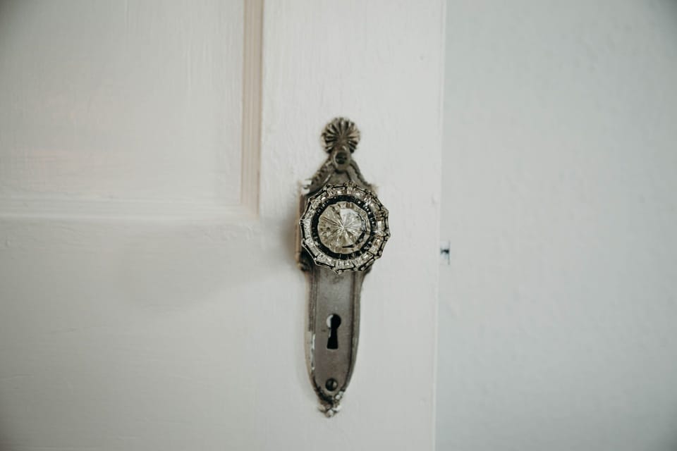 Original glass knobs throughout the house.