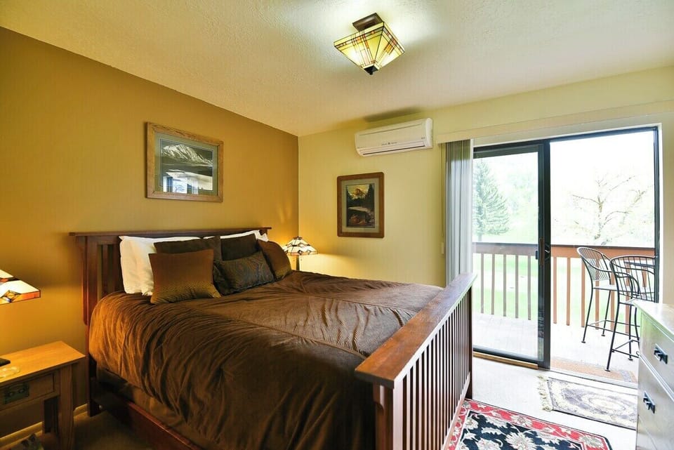 Main Floor Bedroom with private balcony