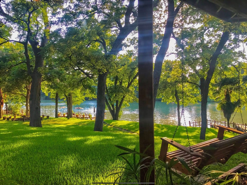 Outdoor Swing overlooking the backyard and river