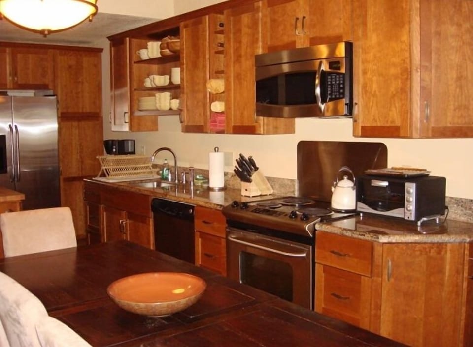 The kitchen is brand new and fully loaded with cooking basics and high-end toys.