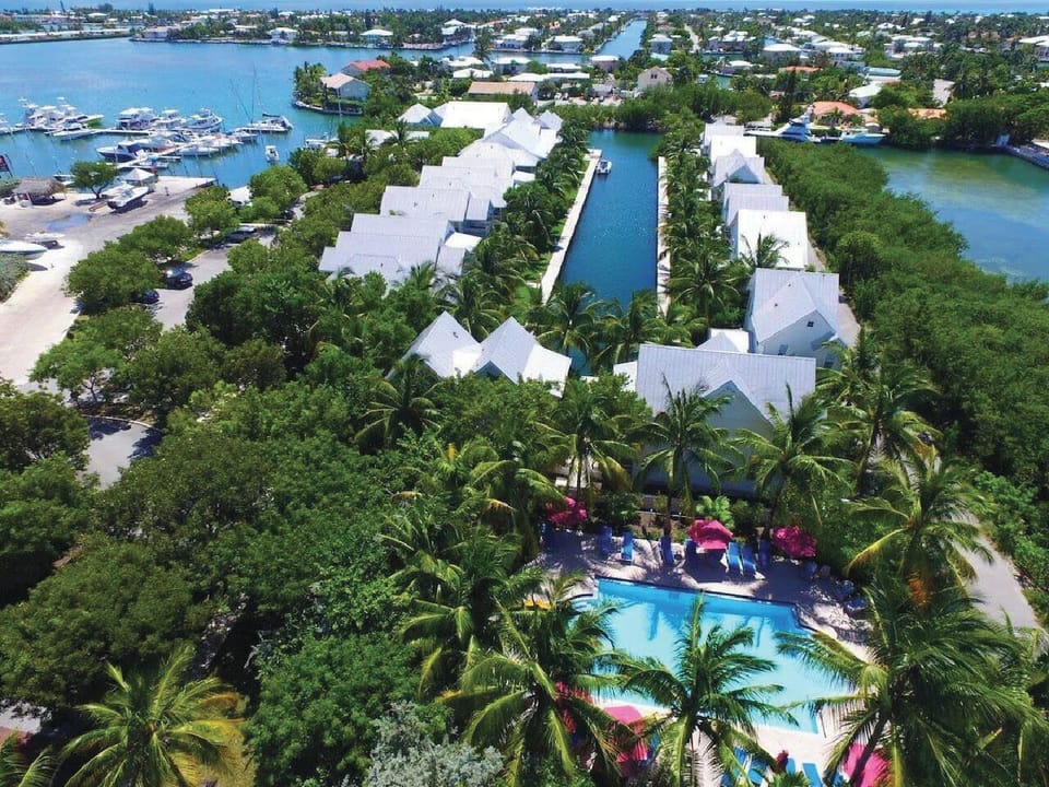 Aerial view of Coral Lagoo's tropical pool and waterfront canal.