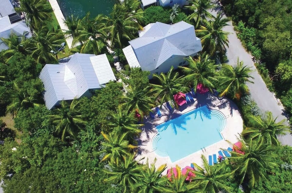 Tropical community pool just steps from our back door. 