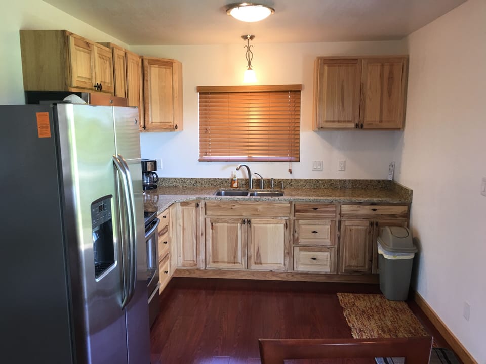 Full size kitchen. Granite counters  and hickory cabinets.  Just bring your food