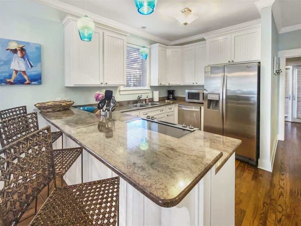 Large kitchen island with bar seating for 3