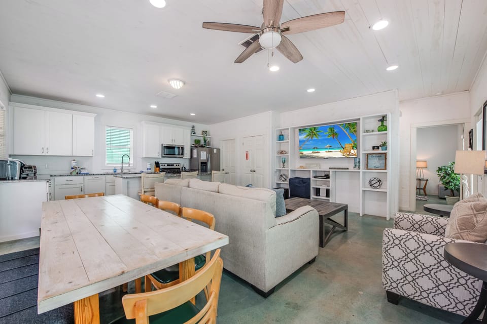 Your open-concept living space flows seamlessly from kitchen to dining to lounge, perfect for gathering with loved ones in comfort.