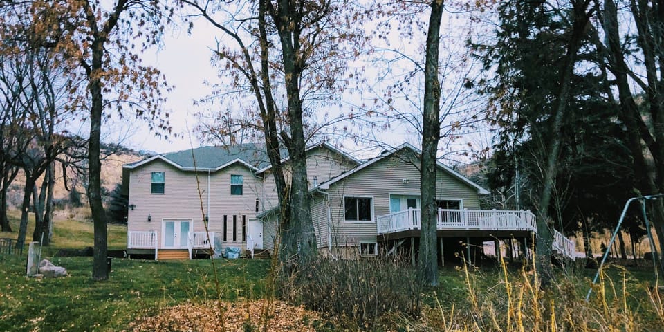 Upstairs main area w/full kitchen, TV, gas stove, exercise eqpt. & walk out deck