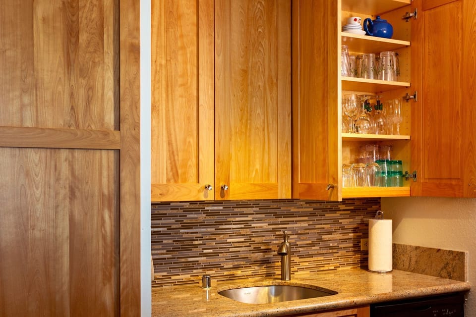 Modern finishes and vibrant glassware make cooking a breeze in paradise!