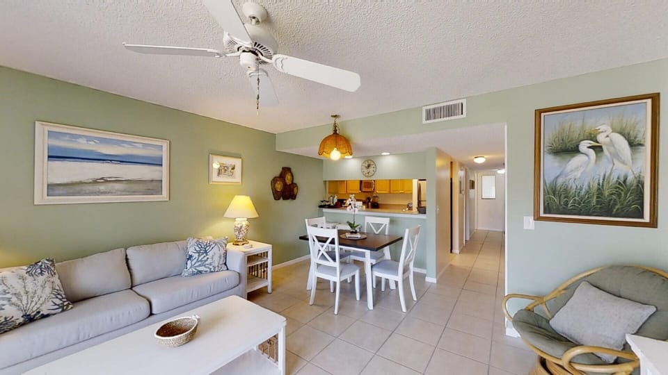 living area view to dining and kitchen