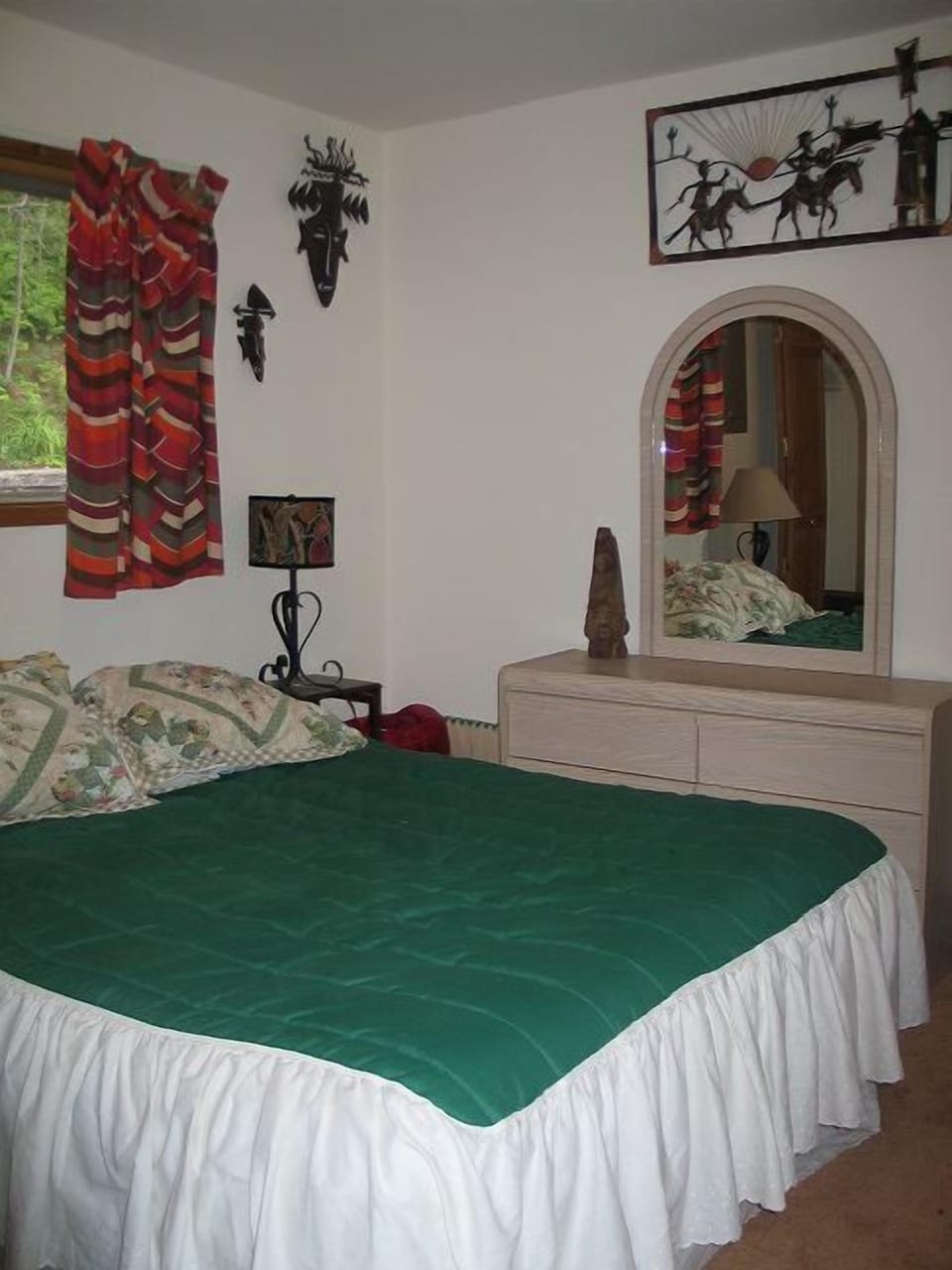 Cozy up in the Mexico inspired Queen room.  