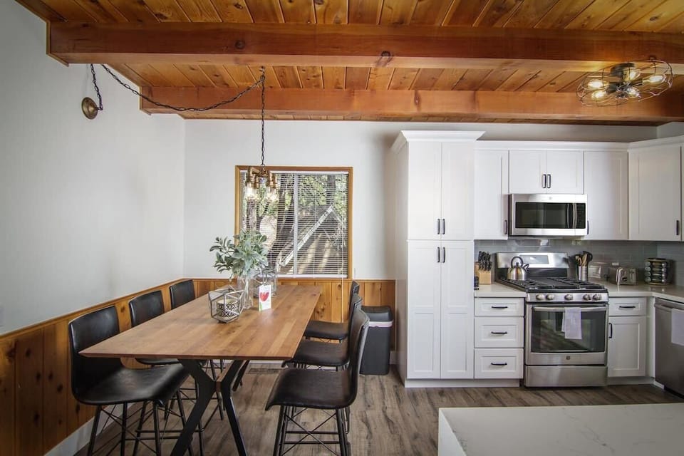 Main Level | Dining Area- Cabin appropriate seating and settings. Tree top view