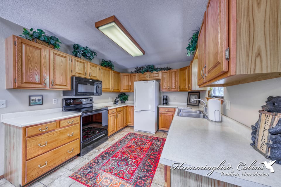 Kitchen is fully stocked with most anything you need to cook with.