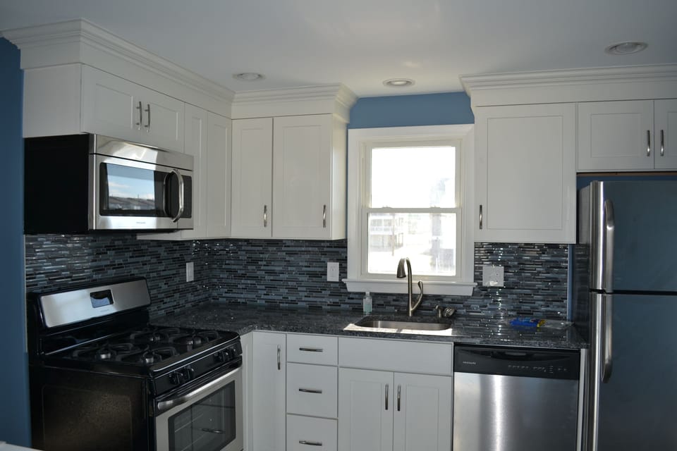 Kitchen with view of marina out window.