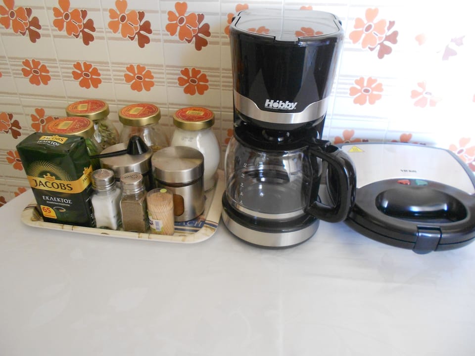 Kitchen fully equipped with coffee maker, toaster, and all the essentials 