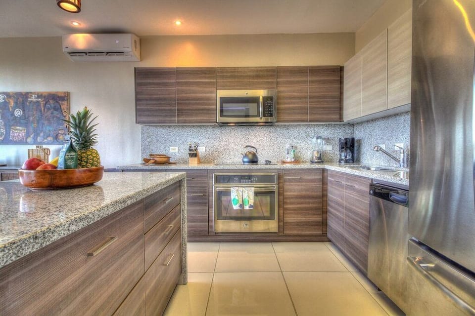 - Fully equipped modern kitchen with granite countertops   - Stainless steel appliances for gourmet cooking ease   - Bright and open layout ideal for extended stays