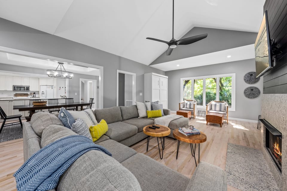 The living, dining and kitchen area open onto each other.