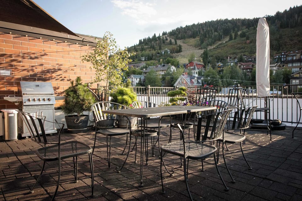 Galleria roofdeck overlooking Main Street with grill and dining seating