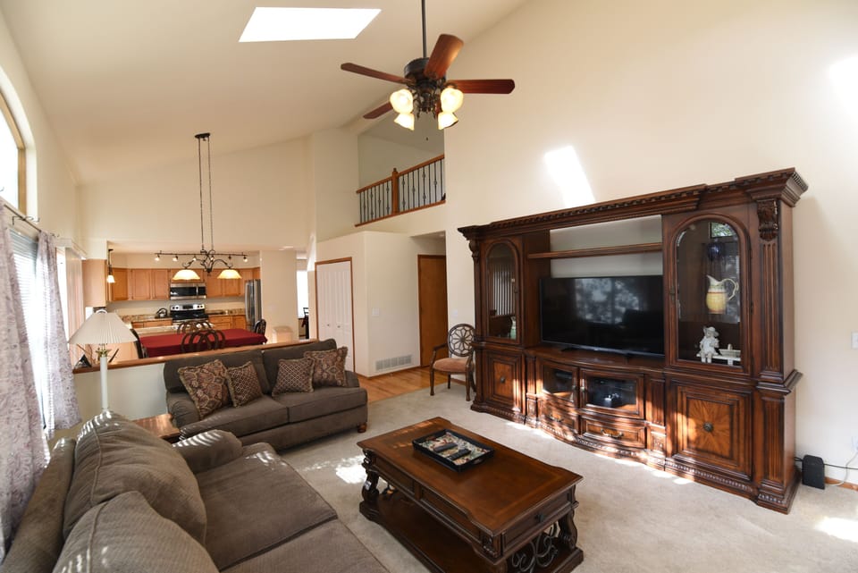 Large open living room with vaulted ceiling
