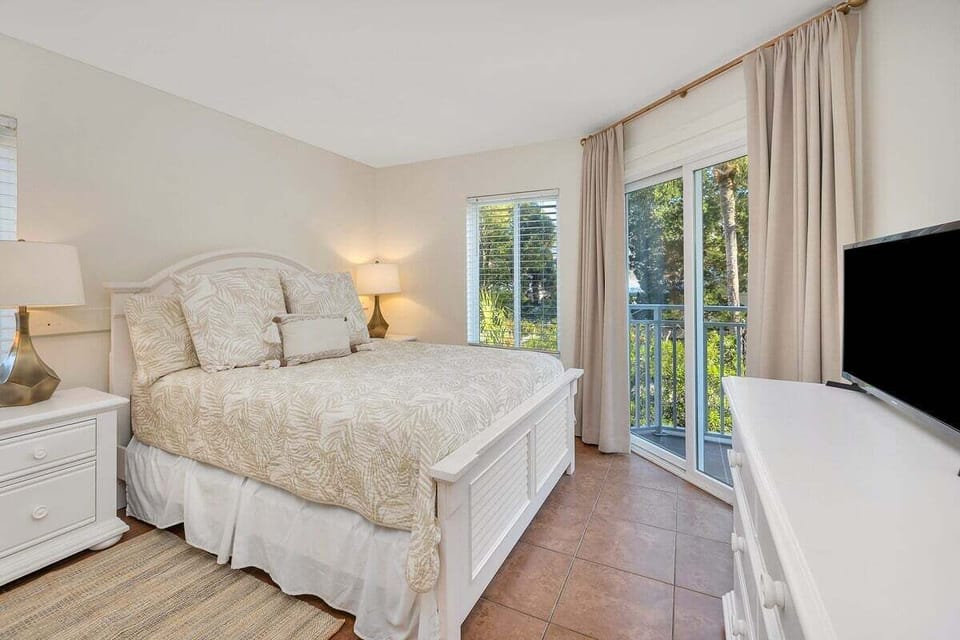 Beach Club 101 - Guest Bedroom with Queen Size Bed and Private Balcony Access