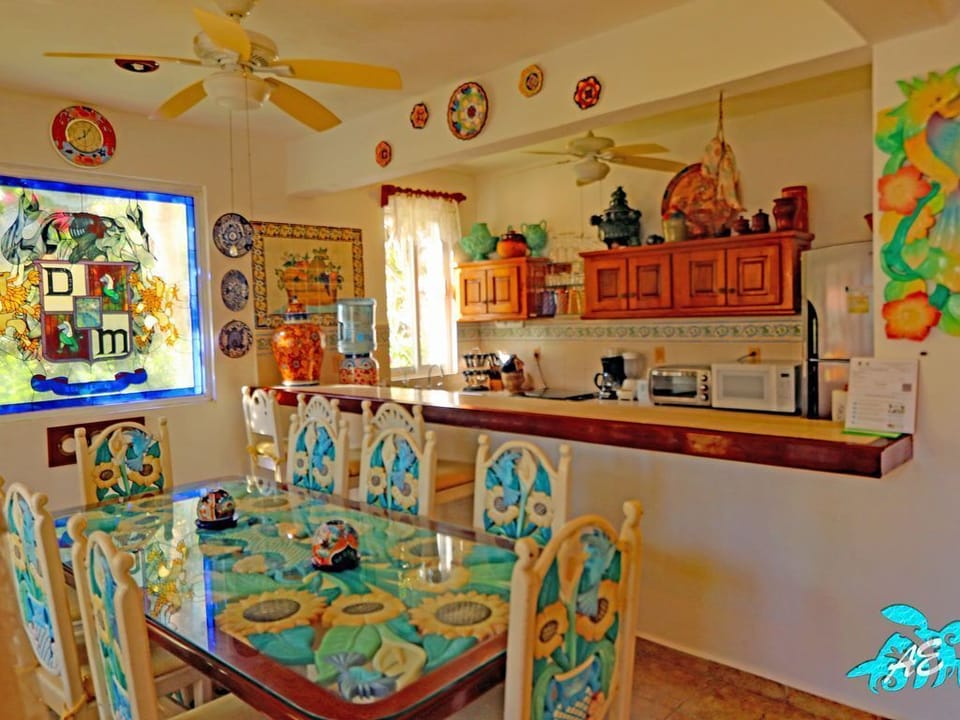 A Hand Carved Dining Set & Spacious Seating for Family Gatherings