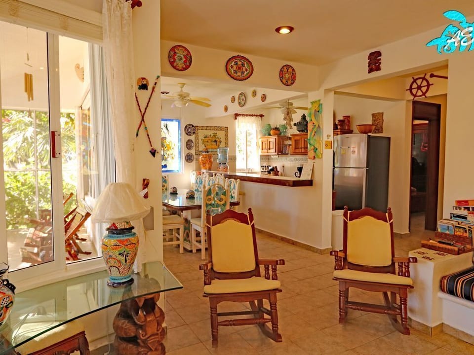 Looking from the Living to the Dining and Kitchen: Mayan Craftsmanship Abounds