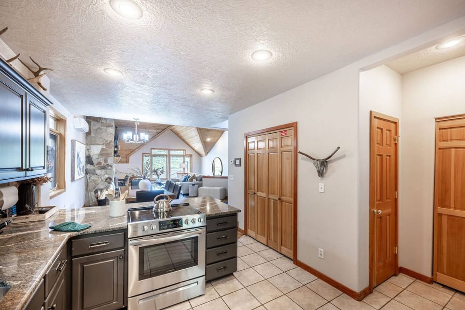 1190 Lowell Ave, Park City Utah has a spacious kitchen with full size, stainless steel appliances.
