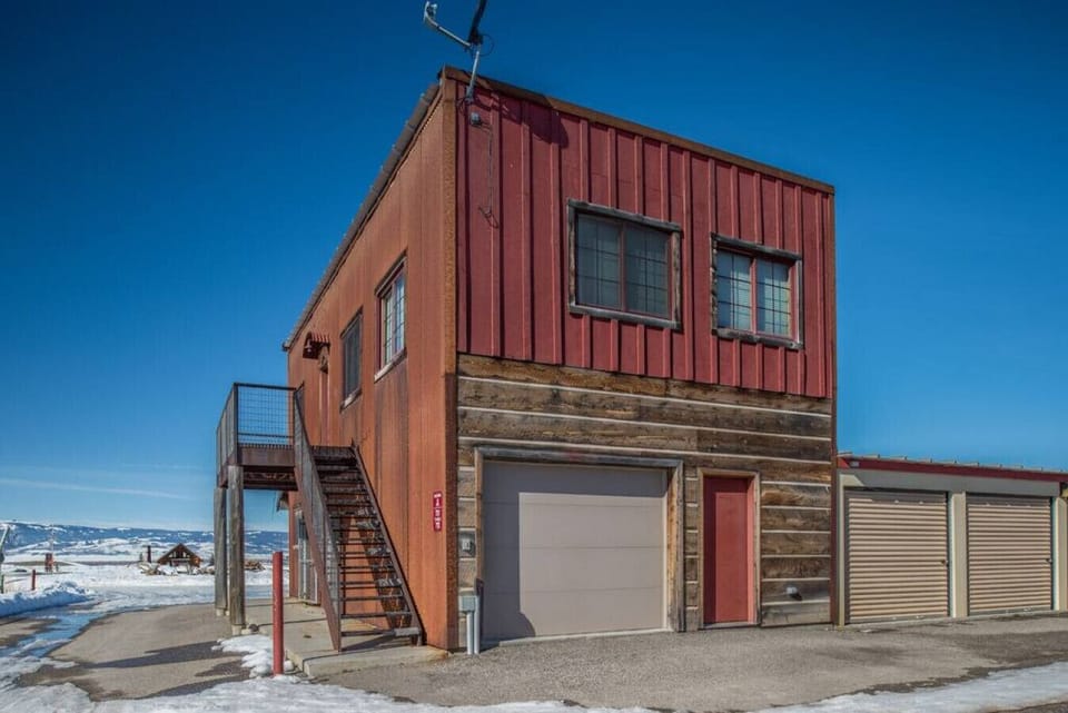 Exterior of garage and upstairs apartment