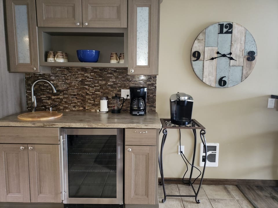 Beverage cooler, sink and coffee bar