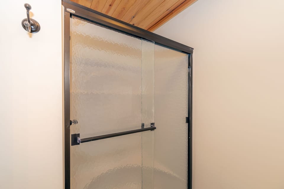 Shared bathroom on lower level