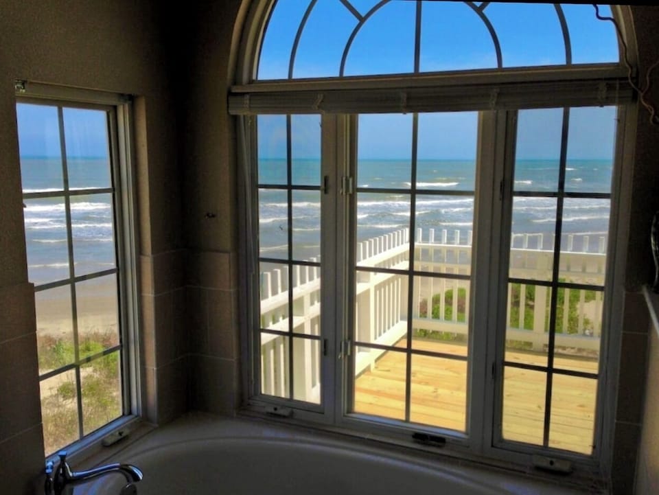 Huge beach views from the master bathroom, overlooking the master bedroom deck.