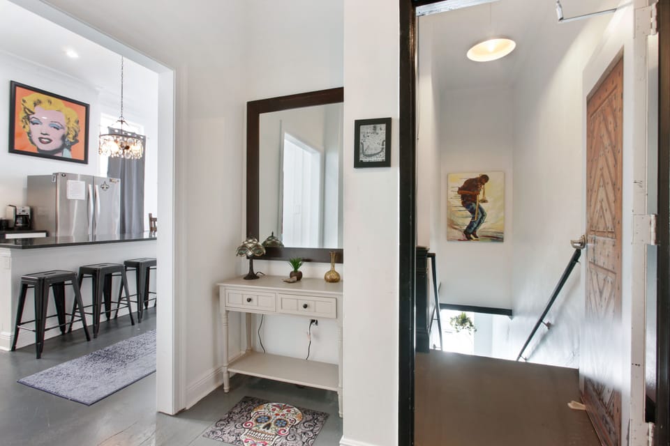 It’s the entire 2nd floor up 1 flight of stairs. Eclectic wall decor throughout 