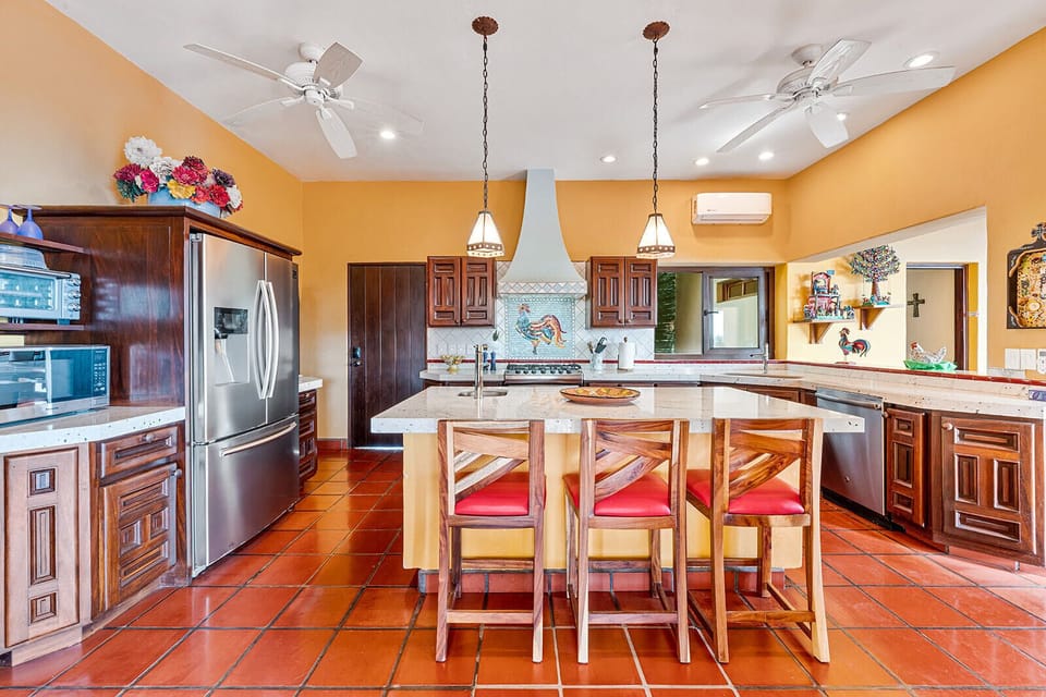 The kitchen is spacious and well equipped.