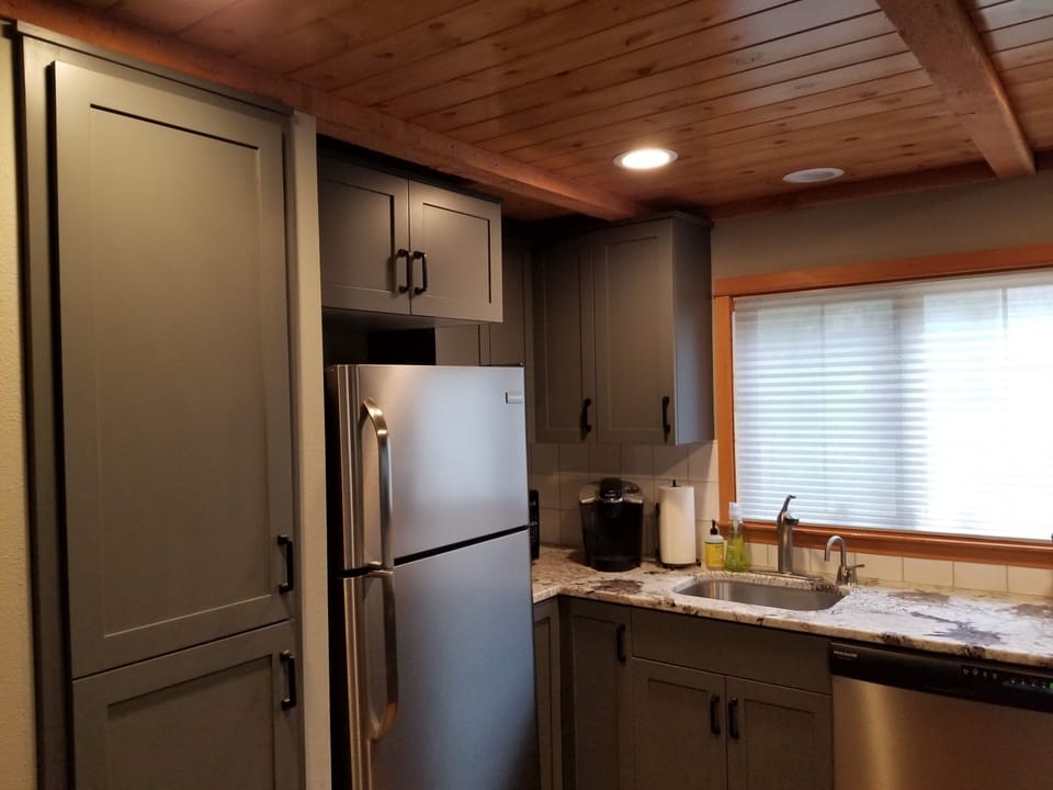 All new kitchen cabinets and granite counter top