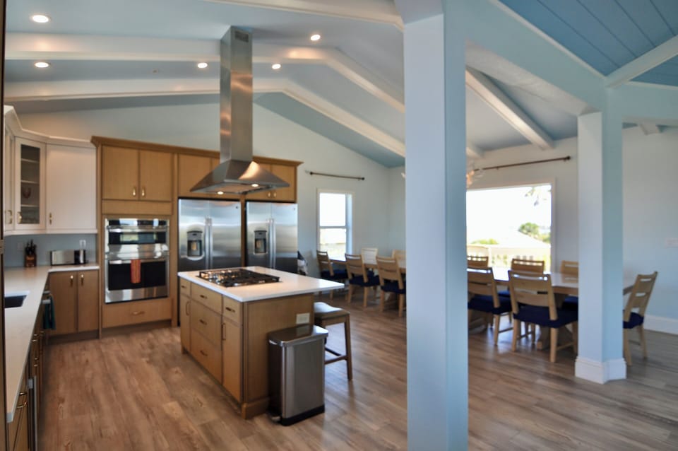 Chef's kitchen, gas range, double fridges & ovens, wine chiller, quartz counters