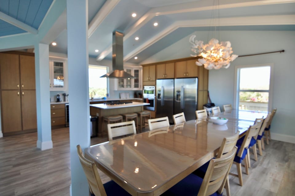Seating for 13! Additional just out the door on the screened deck & island 
