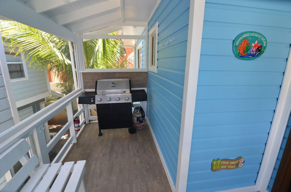 Screened-in, private front patio. Great for beach toys or a BBQ.
