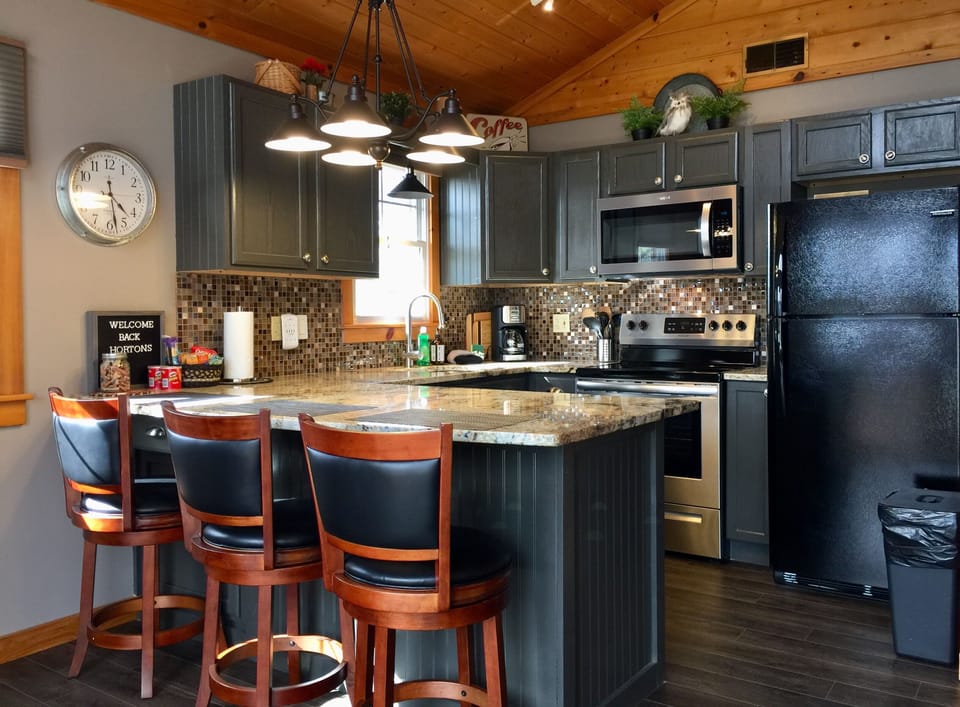 Fully remodeled kitchen is nicely equipped for easy dining at home