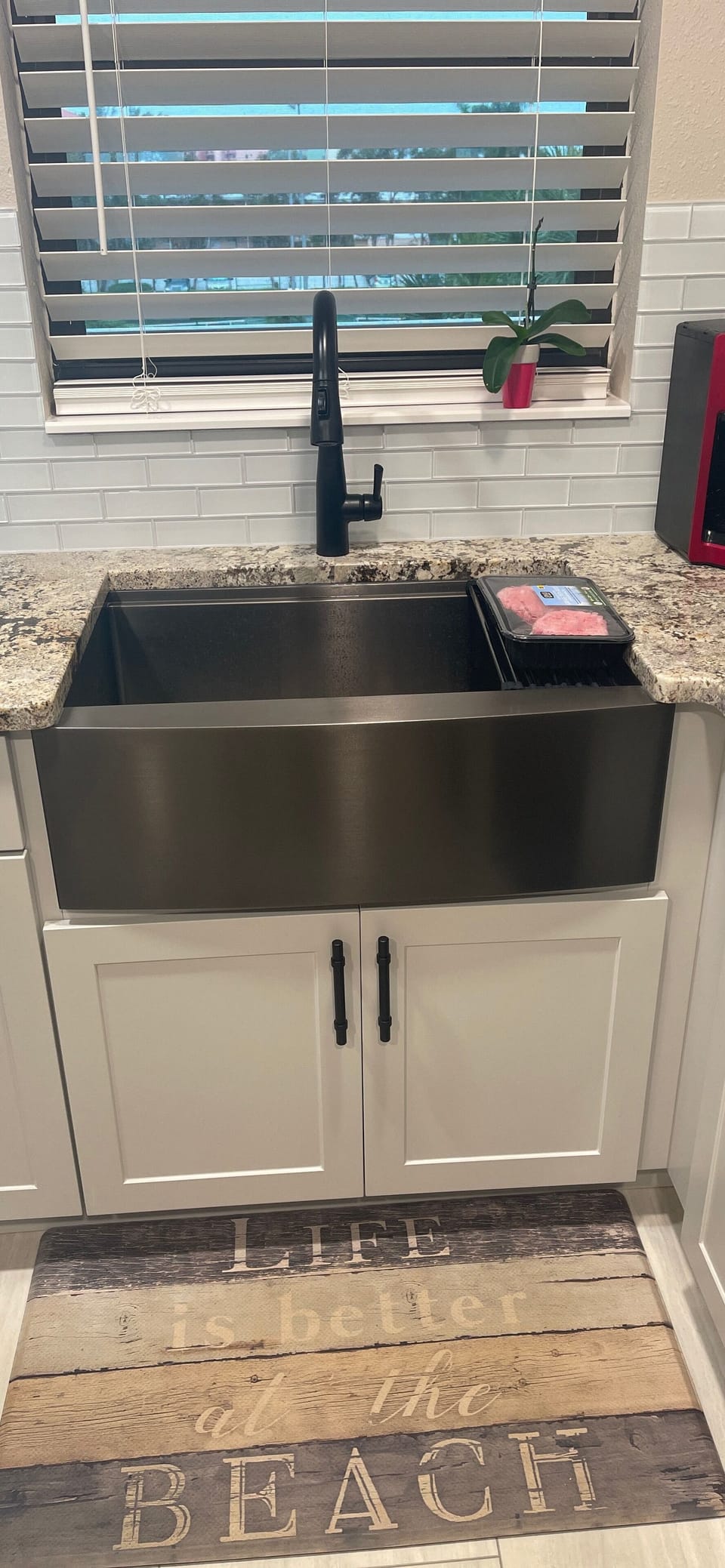 Apron sink has built in work station with draining rack, cutting board &strainer