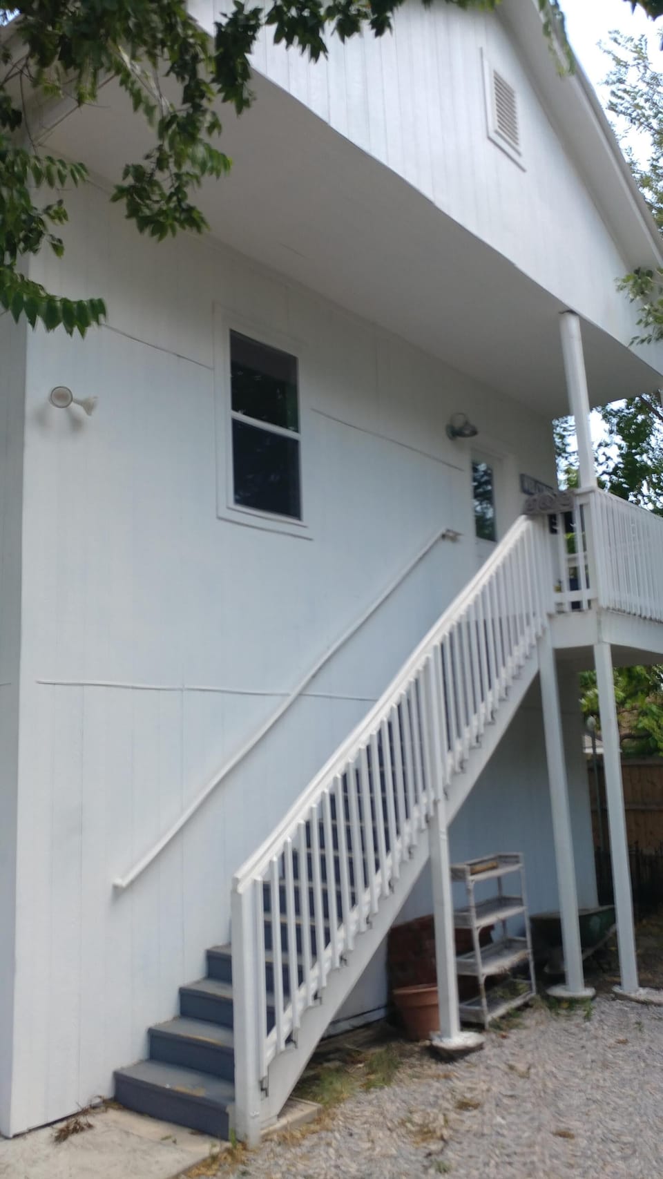 stairs up to landing and entry
