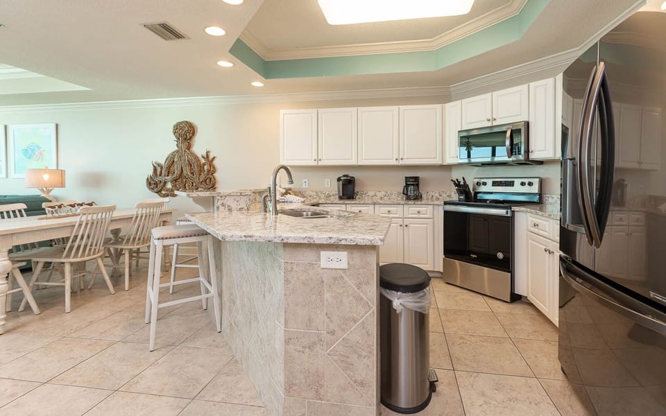 Prepare meals in the spacious kitchen, featuring stainless appliances, sylish countertops, Keurig and coffee maker